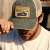 Kap - Black River Racer Washed Trucker (donkergroen/room)