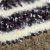 Muts - Gårda Quellon Knit Earflap Beanie (bruin/veelkleurig)
