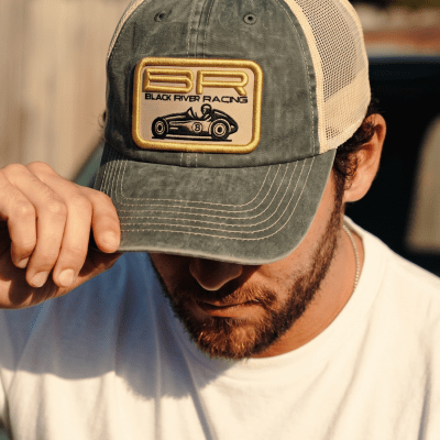 Kap - Black River Racer Washed Trucker (donkergroen/room)